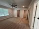 Comfortable main bedroom with neutral walls, carpet, ceiling fan, walk in closets, and plenty of natural light at 4029 Port Richmond Ave # 6, Gastonia, NC 28056