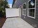 A private outdoor patio with a white fence, offering a cozy space for relaxation at 4029 Port Richmond Ave # 6, Gastonia, NC 28056