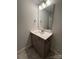 Neutral bathroom featuring a single vanity with a large mirror, a towel rack, and modern fixtures at 4037 Port Richmond Ave # 8, Gastonia, NC 28056
