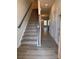 Inviting entryway with staircase and open floor plan showcasing the home's spaciousness at 4037 Port Richmond Ave # 8, Gastonia, NC 28056