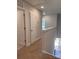 Upstairs hallway with carpet floors, access to other rooms, and natural light at 4037 Port Richmond Ave # 8, Gastonia, NC 28056