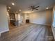 Spacious open floor plan with an eat-in kitchen featuring modern finishes and ample lighting at 4037 Port Richmond Ave # 8, Gastonia, NC 28056