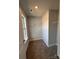 A walk-in closet featuring carpeted floors, bright walls, and shelving and a window providing natural light at 4037 Port Richmond Ave # 8, Gastonia, NC 28056