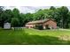 Large backyard with in-ground pool, patio, and mature landscaping at 4916 Leepers Creek Rd, Maiden, NC 28650
