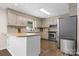Well-equipped kitchen features stainless steel appliances, an island, and ample counter space at 4916 Leepers Creek Rd, Maiden, NC 28650