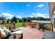 Large wooden deck ideal for entertaining features outdoor furniture and grill overlooking spacious backyard at 509 Brawley Rd # 7, Cleveland, NC 27013