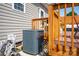 Wood deck attached to the home, with stairs, supports, and a partial view of outdoor furniture at 509 Brawley Rd # 7, Cleveland, NC 27013