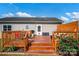 Spacious back deck features outdoor seating, a grill, and beautiful landscaping for outdoor entertaining at 509 Brawley Rd # 7, Cleveland, NC 27013