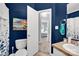 Chic bathroom with navy blue walls, a white vanity, and modern fixtures for a sleek look at 509 Brawley Rd # 7, Cleveland, NC 27013