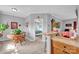 Open dining area with wood table, flows into a bedroom and living space, creating an airy feel at 509 Brawley Rd # 7, Cleveland, NC 27013