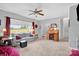Bright and airy living room with large windows, comfortable seating, and a cozy ambiance at 509 Brawley Rd # 7, Cleveland, NC 27013