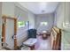 Bathroom in need of repair, featuring a sink, toilet, and lots of renovation opportunity at 5604 Nc 152 E Hwy, Rockwell, NC 28138