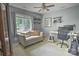 Comfortable bedroom with natural light, neutral tones, and stylish furniture, creating an inviting space at 5995 Tall Tree Ln, Harrisburg, NC 28075
