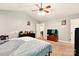 Bedroom with ceiling fan, neutral walls, and carpet flooring at 605 Beavers Cove Nw Ln # 15, Concord, NC 28027