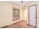 Bedroom with wood floors, window, and closet at 6227 Dogwood Ln, Waxhaw, NC 28173