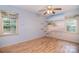 Bedroom with a beach mural and built-in shelves at 6227 Dogwood Ln, Waxhaw, NC 28173