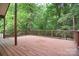 Spacious deck overlooking a lush green wooded backyard, perfect for outdoor living at 6227 Dogwood Ln, Waxhaw, NC 28173