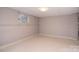 Room features a window, neutral walls, and access to the outside at 6227 Dogwood Ln, Waxhaw, NC 28173