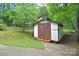 An exterior view of the shed in the backyard at 6227 Dogwood Ln, Waxhaw, NC 28173