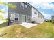 A view of the backyard with a patio and lush green grass, perfect for outdoor relaxation and entertainment at 711 Bellmouth Rd, Clover, SC 29710
