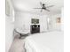 Cozy main bedroom with a fan, soft chair, dresser, and TV at 711 Bellmouth Rd, Clover, SC 29710