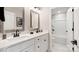 Modern bathroom with double vanity, quartz countertop, and tub/shower combo at 7137 Butternut Oak Ter, Huntersville, NC 28078