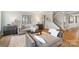 Comfortable living area with hardwood floors, neutral decor, and a staircase leading upstairs at 7137 Butternut Oak Ter, Huntersville, NC 28078