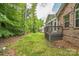 Brick home featuring a well maintained yard and screened in porch at 8336 Early Bird Way, Mint Hill, NC 28227
