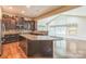 Gourmet kitchen boasts granite counters, stainless appliances and an island at 8336 Early Bird Way, Mint Hill, NC 28227