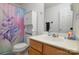 Bathroom featuring stylish unicorn curtain, toilet and sink at 8511 Redding Glen Ave, Charlotte, NC 28216