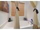 Bathroom featuring bathtub and stylish curtains at 8511 Redding Glen Ave, Charlotte, NC 28216
