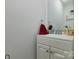 Bathroom with a white vanity, sink, and mirror, providing a clean and functional space at 8511 Redding Glen Ave, Charlotte, NC 28216