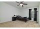 Bedroom with ceiling fan and window at 8511 Redding Glen Ave, Charlotte, NC 28216