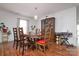Elegant dining room with hardwood floors and classic furniture at 8511 Redding Glen Ave, Charlotte, NC 28216