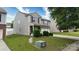 Attractive two-story home with gray siding, stone accents, and a well-maintained front yard at 8511 Redding Glen Ave, Charlotte, NC 28216