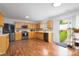 Well-lit kitchen featuring stainless steel appliances and a view to the yard at 8511 Redding Glen Ave, Charlotte, NC 28216