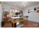 Bright office space with wood floors, multiple desks, and natural light at 8511 Redding Glen Ave, Charlotte, NC 28216