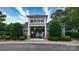 Gated pool and amenity center in a community with lush landscaping on a sunny day at 8511 Redding Glen Ave, Charlotte, NC 28216