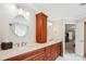 Bathroom featuring a double vanity with stone countertops and dark wood cabinets at 8612 Tintinhull Ln, Waxhaw, NC 28173