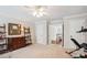 Large bonus room featuring neutral colors, an array of doors, and ample space for activities at 8612 Tintinhull Ln, Waxhaw, NC 28173