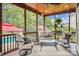 Enjoy the outdoors on this cozy screened porch with comfortable seating, perfect for relaxation and entertaining guests at 8612 Tintinhull Ln, Waxhaw, NC 28173