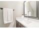 Bathroom with a sink, mirror, and towel racks at 8700 Thornbury Ln, Huntersville, NC 28078