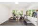 Functional home gym with exercise equipment and a mirror, providing a convenient space for your fitness routine at 8700 Thornbury Ln, Huntersville, NC 28078