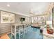 Relaxing sunroom features comfortable seating and natural light, perfect for unwinding and entertaining at 8700 Thornbury Ln, Huntersville, NC 28078
