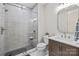 Modern bathroom featuring a tiled walk-in shower and a stylish vanity at 9021 Unbridle Ln, Waxhaw, NC 28173