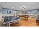 Fun game room with ping pong table, pool table, and other recreational activities for entertainment at 9021 Unbridle Ln, Waxhaw, NC 28173