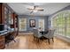 Office showcasing a built-in bookcase, natural light, and space for a round meeting table and desk at 9021 Unbridle Ln, Waxhaw, NC 28173
