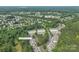 Aerial view of the community features scenic streets, lush landscaping, mature trees and neighborhood amenities at 916 Coffee Tree Ln, Rock Hill, SC 29732