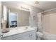 Clean bathroom featuring a tub and shower combination with an extended vanity at 916 Coffee Tree Ln, Rock Hill, SC 29732
