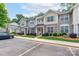Charming townhome community showcases manicured lawns, stone accents, and convenient parking in a desirable location at 916 Coffee Tree Ln, Rock Hill, SC 29732